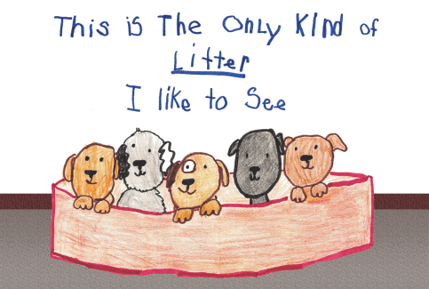 A litter of puppies in a box with the slogan 'This is The Only Kind of Litter I like to See' above them