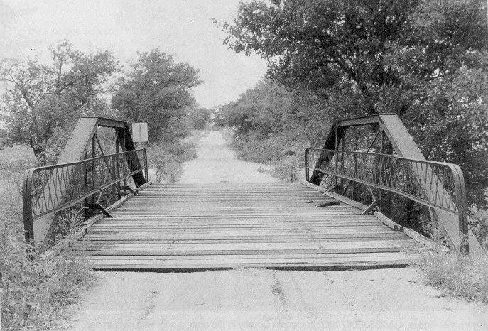 Bridge 24E0300N2800004, though it resembles a queen post truss, is a small Pratt dating from before the First World War.
