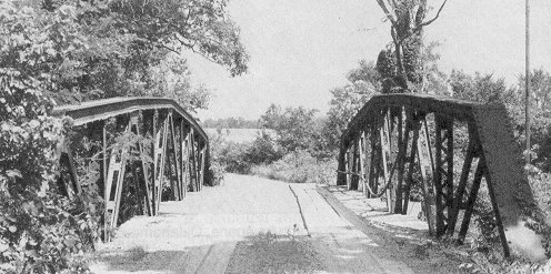 Indiana's Vincennes Bridge Company built Bridge 51E0930N4140009 in 1911.  A heavily built, 80-foot Warren pony truss with a polygonal top chord, it spans a creek near Boynton in Muskogee County.