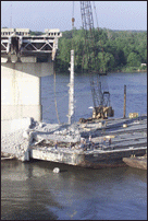Barge Beginning Move Away from Bridge