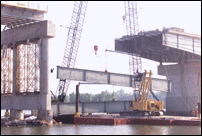Lifting Steel Beam into Place on Span Four
