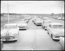 Cars are backed up waiting their turn to try out the Turner Turnpike, the first superhighway in Oklahoma.